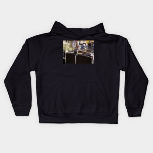 Iconic vintage car with a bird Kids Hoodie